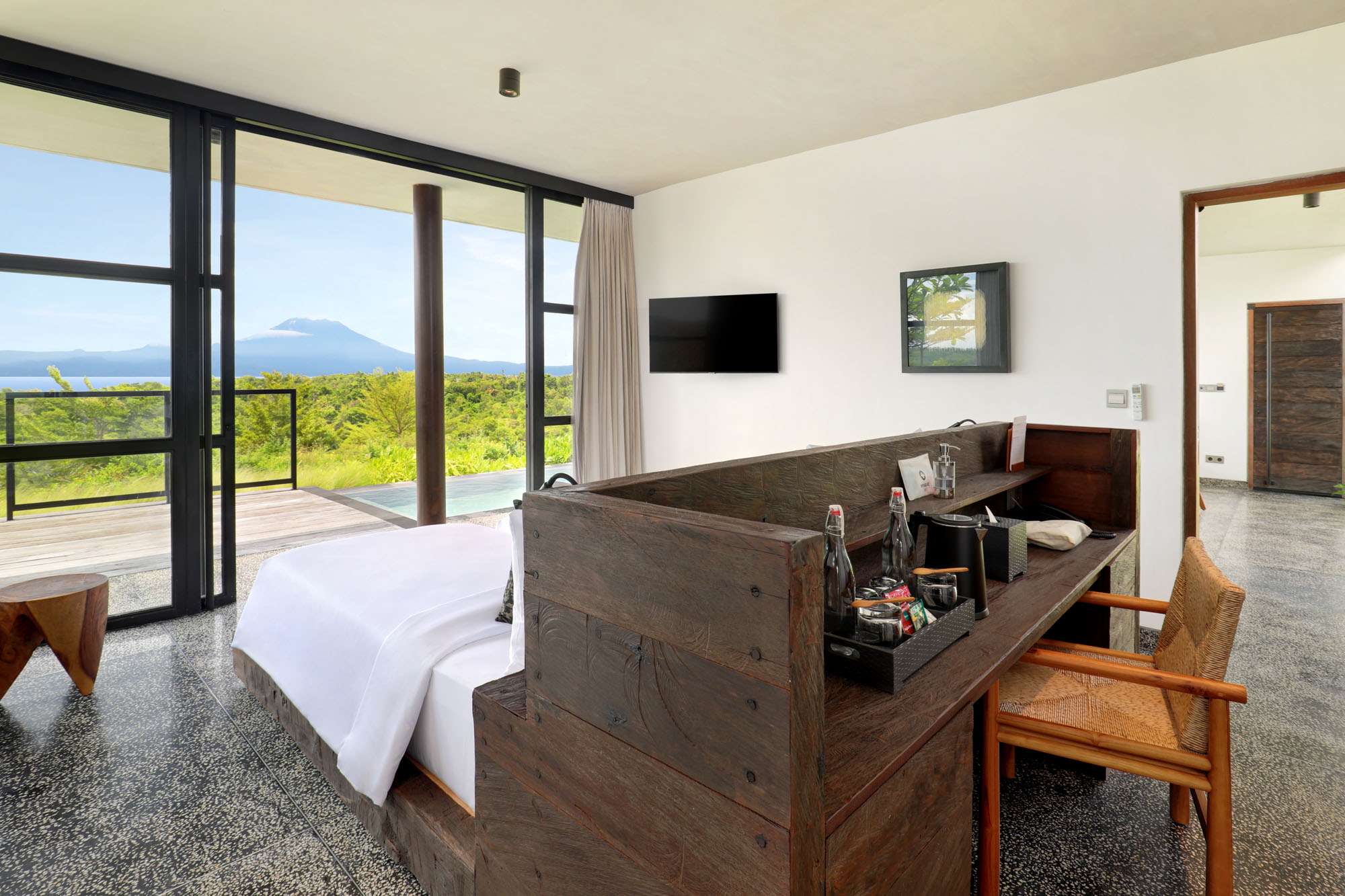 Two Bedrooms Suite Bedroom with pool and mountain view